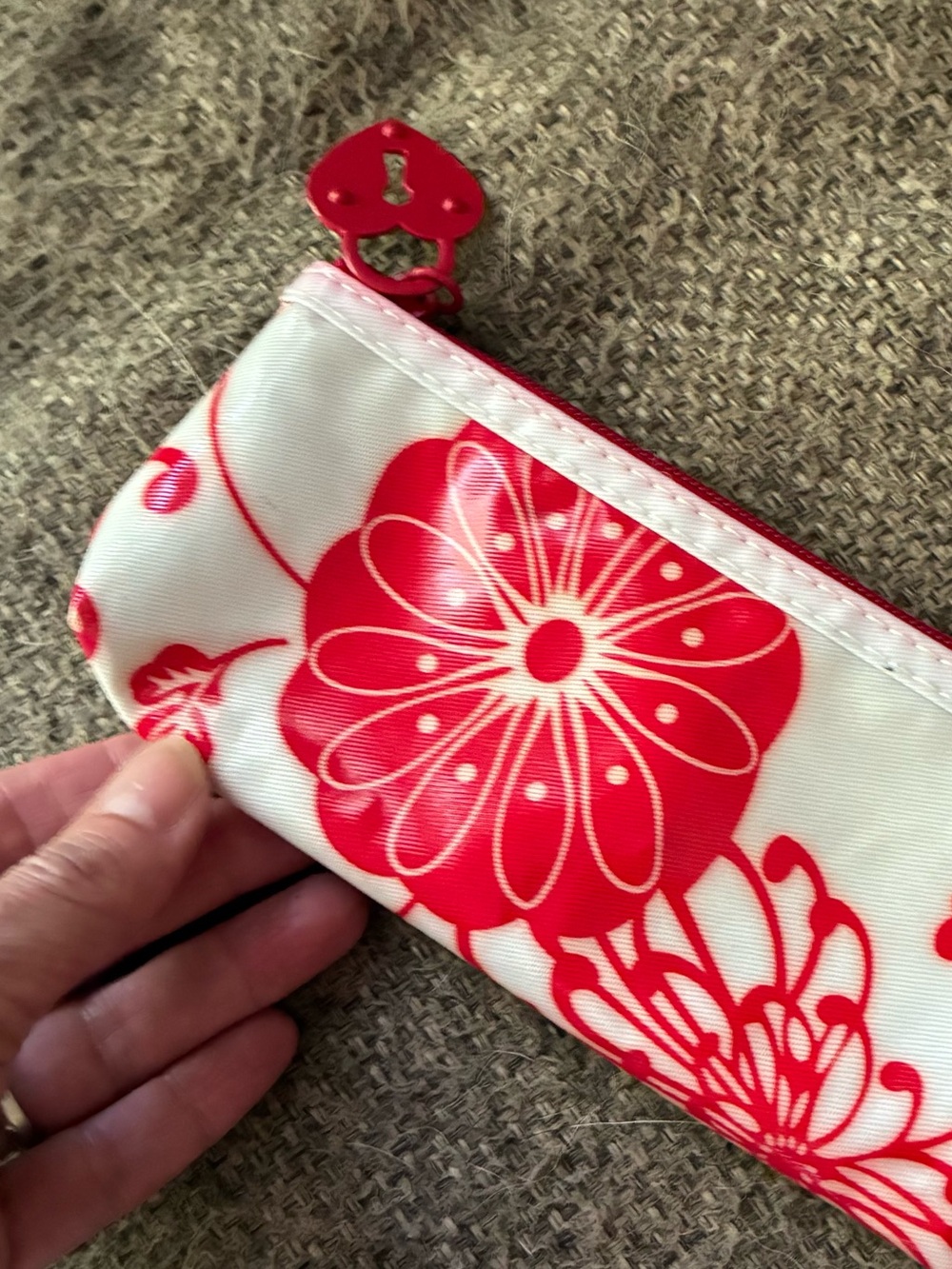 Red and white cosmetic pouch